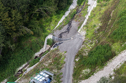 Flexible mudslide barriers